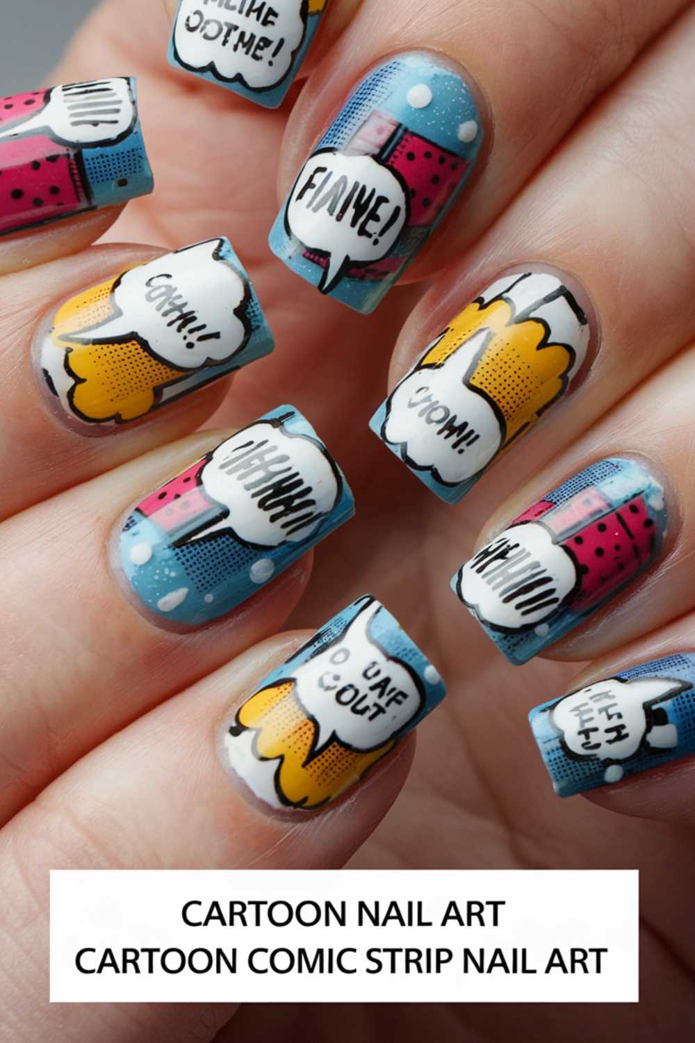 Fingernails flaunt cartoon nail art designs with vibrant comic strip flair, showcasing speech bubbles with Wham! and Ka-pow! against a blue backdrop. Bold graphics and bright colors amplify the playful comic theme.